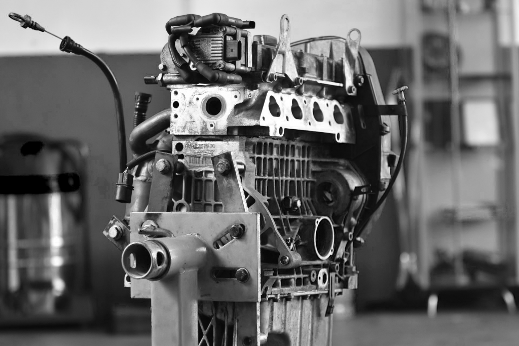 black and white image of car engine